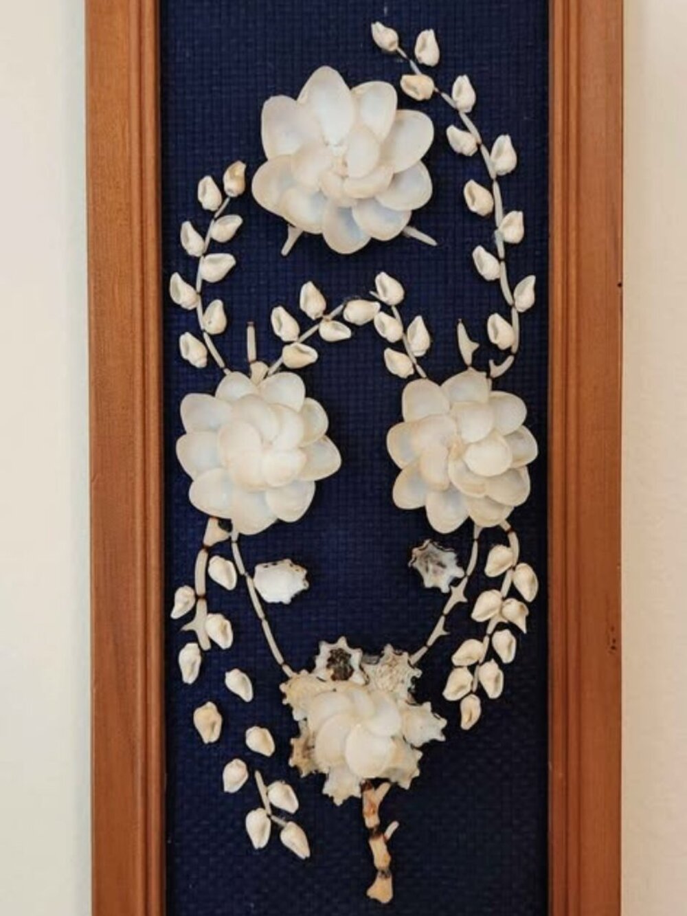 Small floral art made with shells